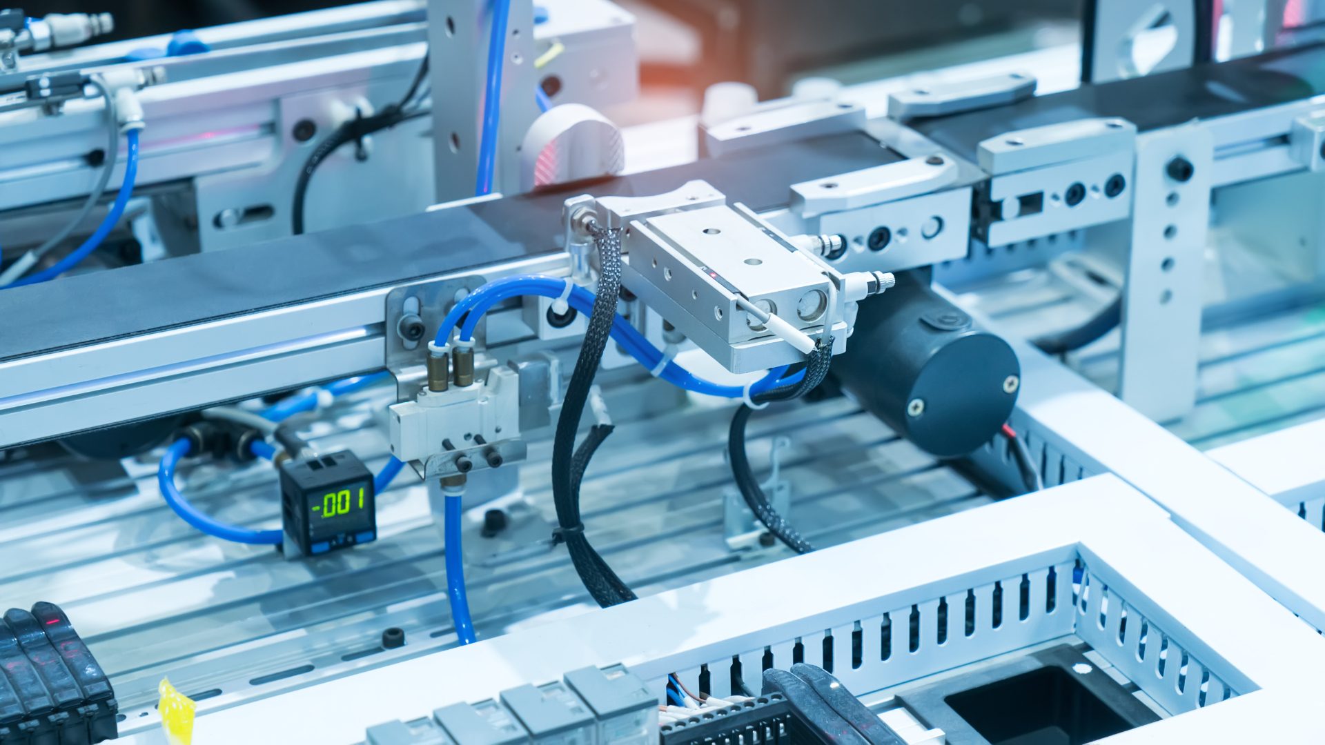 Material handling and conveyor pneumatic actuator installation